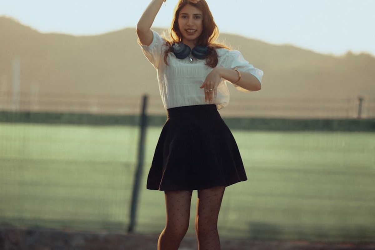 Dynamic silhouette of a person moving in a bright light